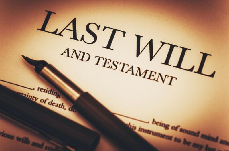Last will and testament document with pen.